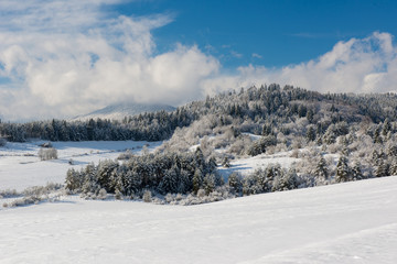 Fototapeta na wymiar Frozen snow-covered landscape, fairytale winter in central Slovakia, Europe