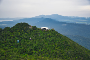 Fototapeta na wymiar Panoramic pictures of the peaks of Gunung Mat Chincang Mountain with the famous Langkawi Cable Car