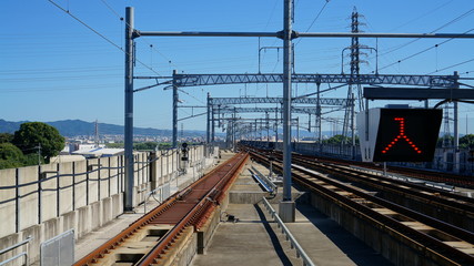 Fototapeta premium Railways and stop sign at japanese train station, Japan.