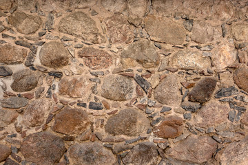 Texture of natural stone wall as background