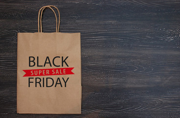 Black Friday sale shopping banner. Mockup of special day, empty black board for logo and text. Isolated black wood texture background