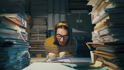 Tied up office worker calling for help