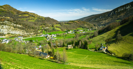Naklejka premium Small settlement in green valley