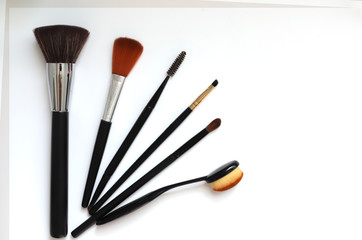 makeup brushes on white background beauty concept, self care, cosmetics store copyscape