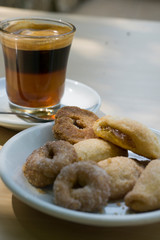 Carajillo coffee with cognac and typical pastries in Valencia Spain