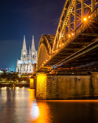 Fototapeta na wymiar Cologne with Cologne Cathedral und Rhine river by night