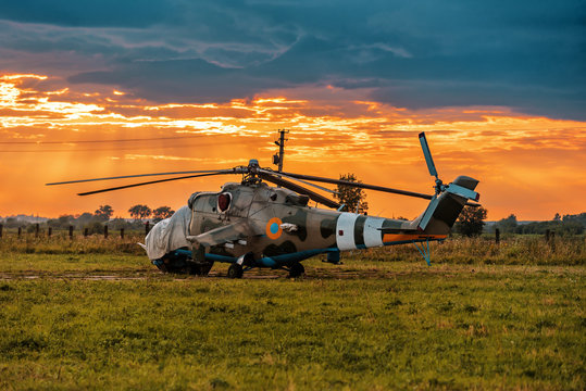 military helicopter on sunset