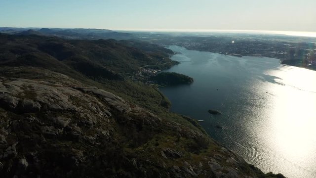 Cinematic Aerial View on Norwegian Fjord From Top of The Mountain With City on Coast. Dalsnuten, Grandsfjord Norway