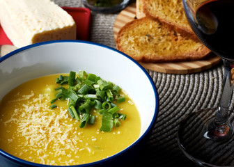 soup with bread, wine and cheese
