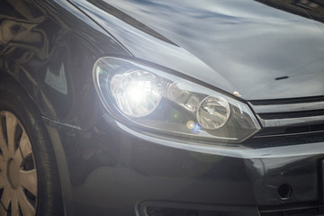 Car Headlight lamp in close up. Modern transport