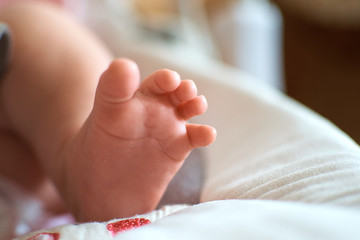 Baby 's heels on soft tuffle mat