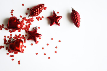Christmas toys on a white background. Decorations for the holiday. Preparation for the New year and Christmas. Toys for decor.