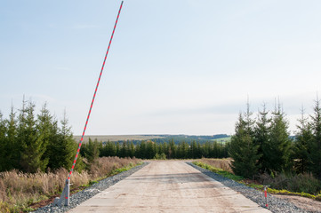 Entrance to the protected area. Barrier at the entrance.