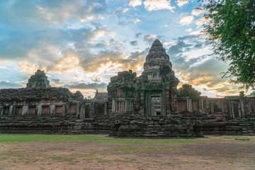 Fototapeta premium The beautiful stone castle in Phimai historical park. Prasat Hin Phimai ancient Khmer Temple in Nakhon Ratchasima Thailand. Phimai stone castle built from laterite stone in Angkorian period arts.