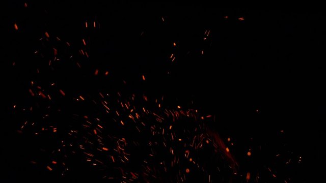 Real flame with sparks background clip in amazing detail. To be used as a track matte to add explosive particles to your project