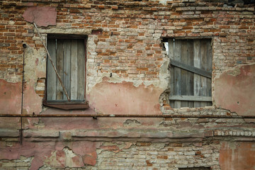 Facade of an abandoned old house.