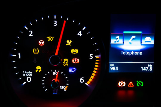 Modern light car mileage on black background