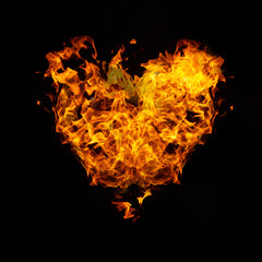 heart on fire on black background.