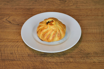 Qassatat ricotta (cassata with cheese) is a Maltese traditonal pastry. Closeup on a wooden table - 299409684