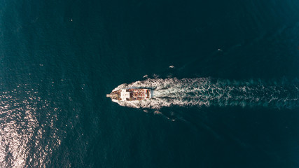 Aerial view of a ferry crossing the Gulf of Roses, Spain.