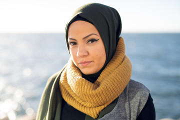 Portrait of a young woman wearing headscarf