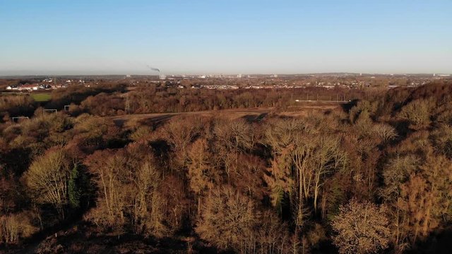 City Viewed Over Winter Trees Coventry Aerial Slow Rise.