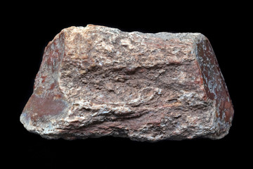 Sample of ancient fossilized red Xylopal, also known as petrified or opalyzed wood.