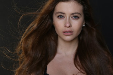 Obraz premium Beautiful young female brunette model