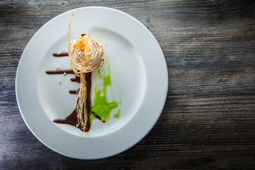 top view on delicious baked swan-shaped cream dessert
