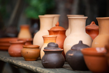 Fototapeta na wymiar Beautiful handcrafted pottery on table