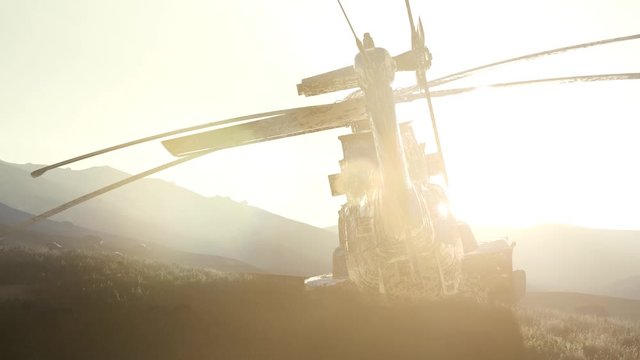 old rusted military helicopter in the desert at sunset