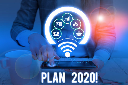 Conceptual hand writing showing Plan 2020. Concept meaning detailed proposal doing achieving something next year Picture photo network scheme with modern smart device