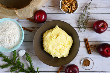 cooking apple pie do it yourself. photo from a series of pictures about cake preparation. tutorial. top view, flat lay. photo 6, dough of eggs, butter and sugar