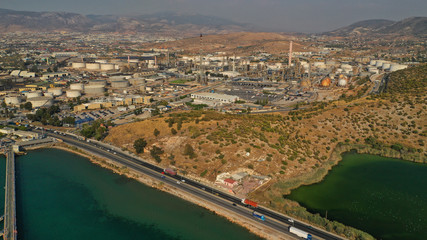 Fototapeta premium Aerial drone photo of industrial refinery of Hellenic Public Petroleum company in gulf of Aspropirgos, Attica, Greece