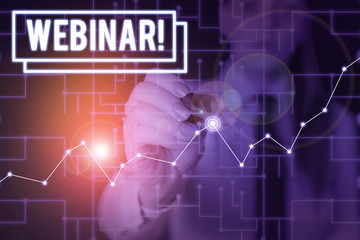 Word writing text Webinar. Business photo showcasing seminar or other presentation types that takes place on Internet Woman wear formal work suit present presentation using smart latest device