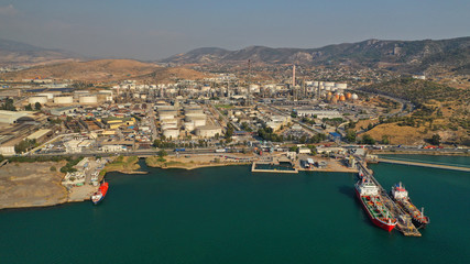 Aerial drone photo of industrial refinery of Hellenic Public Petroleum company in gulf of Aspropirgos, Attica, Greece
