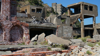 Gunkanjima is an abandoned city of a coal miners on the Hashima island in Japan.