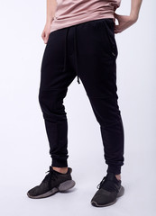 Fototapeta na wymiar man in jeans, denim pants close up on white background, black jeans.
