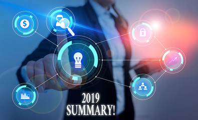 Text sign showing 2019 Summary. Business photo text summarizing past year events main actions or good shows Woman wear formal work suit presenting presentation using smart device