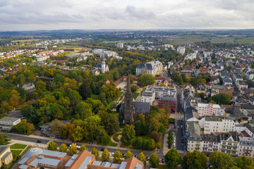Fototapeta na wymiar An aerial panorama of Bad Nauheim (Germany) with autumn trees