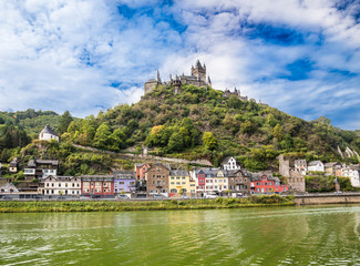 Fototapeta na wymiar The beautiful Reichsburg Cochem (Cochem Imperial Castle) with village and the river Moselle in the foreground, Cochem, Rhineland-Palatinate, Germany, Europe