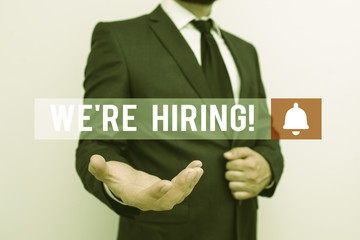 Word writing text We Re Hiring. Business photo showcasing recently employ someone or pay him to do...