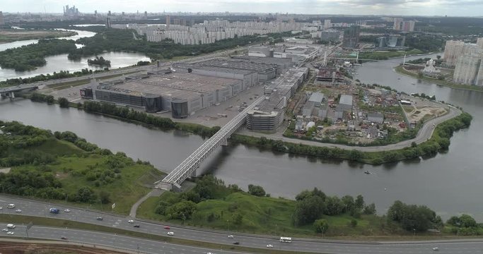 Aerial view on Moscow Automobile Ring Road or MKAD near Volokolamskoye shosse and Mitino, Yuzhnoye Tushino, Pokrovskoye-Streshnevo District of Moscow. Moskva River. Interchange of MKAD and Volokolamsk