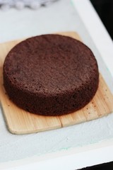 Delicious chocolate cake on a wooden table