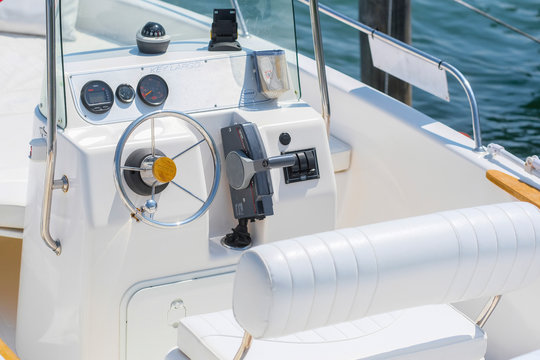 Garda, Italy - July, 20, 2019:  image of a steering wheel on a motor boat