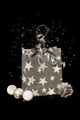Christmas paper bag on black background