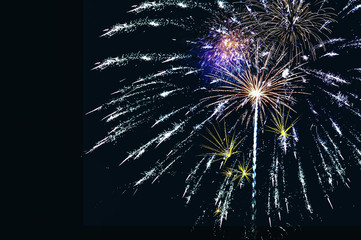 Abstract colored firework background with free space for text