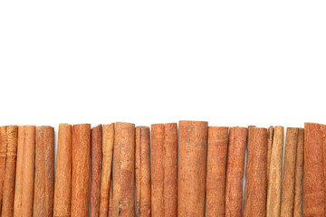 Cinnamon sticks frame isolated on white background, copy space