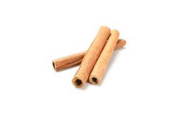 Cinnamon sticks isolated on white background. Sweet spice