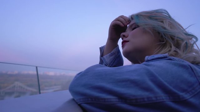 Insecure overweight girl alone in city, fat-shaming depression, low self-esteem